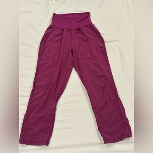 Lululemon yoga cropped pants. Size 2, fuscia color. Like new condition.